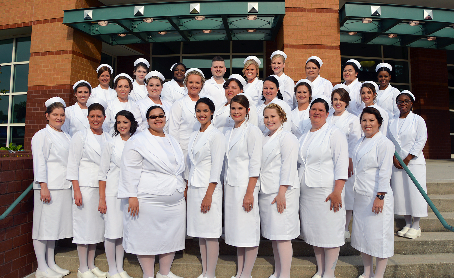 Class of 2017 Associate Degree of Nursing students on the steps of the Cole Auditorium