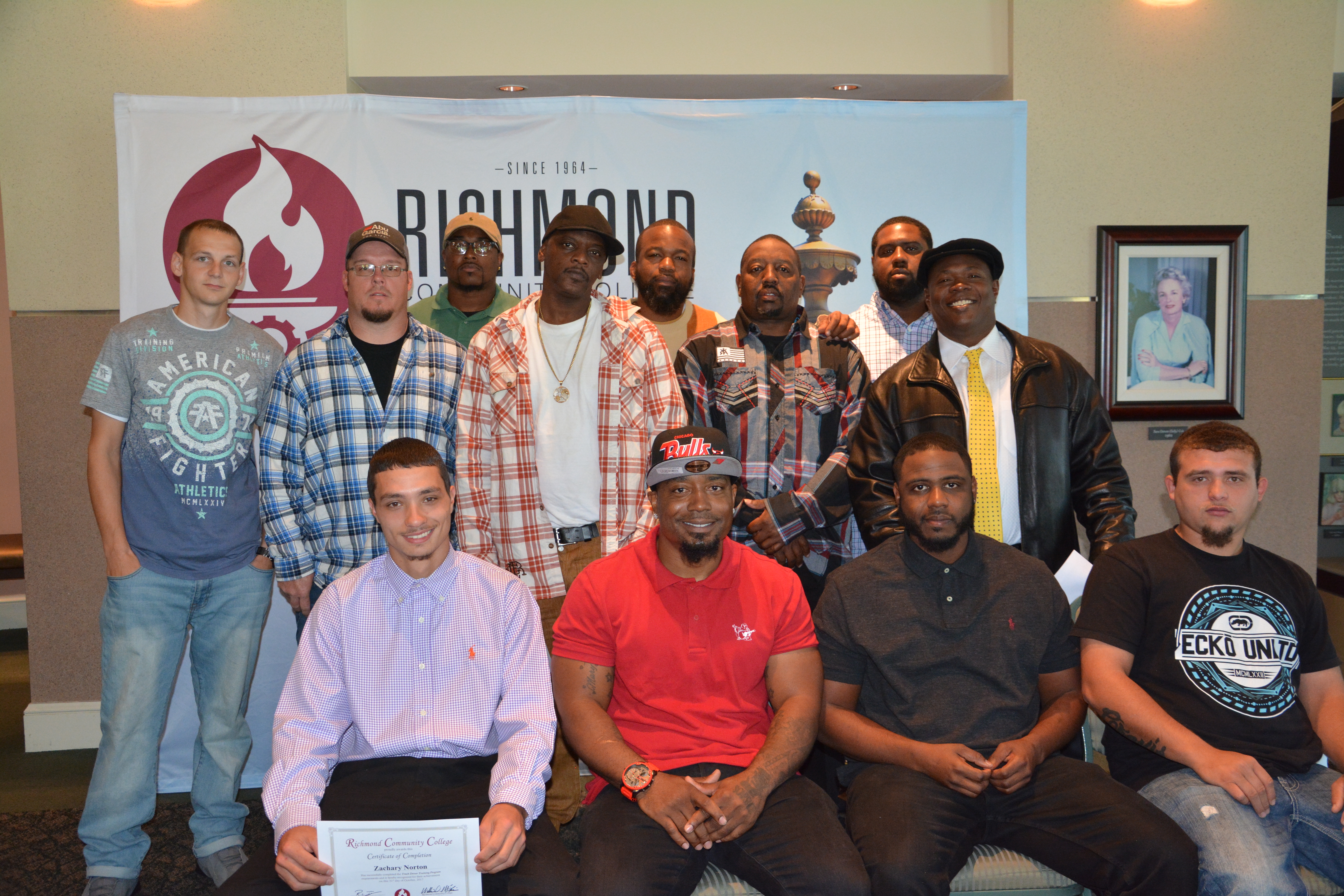 Pictured are the 12 students who graduated Oct. 31 from the truck driver training program at Richmond Community College.