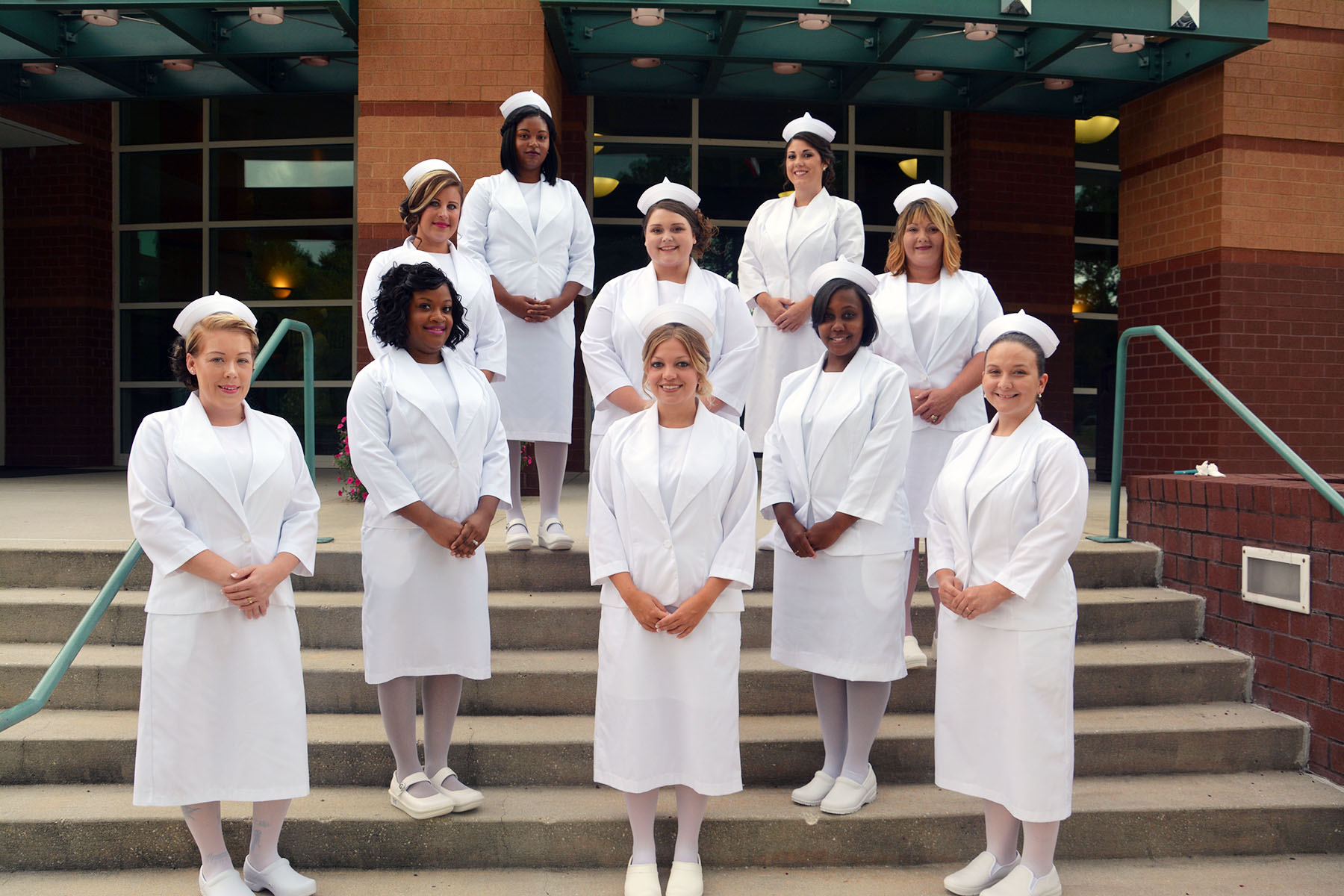 The Practical Nursing Class of 2017 stands on the steps of the Cole Auditorium.