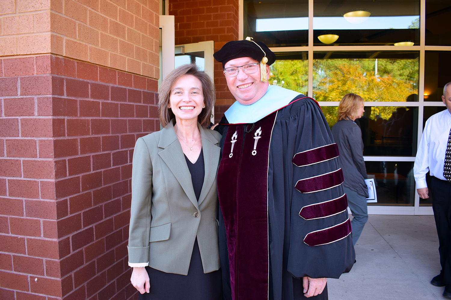 Jennifer Haygood and Dr. McInnis stand together outside the Cole Auditorium