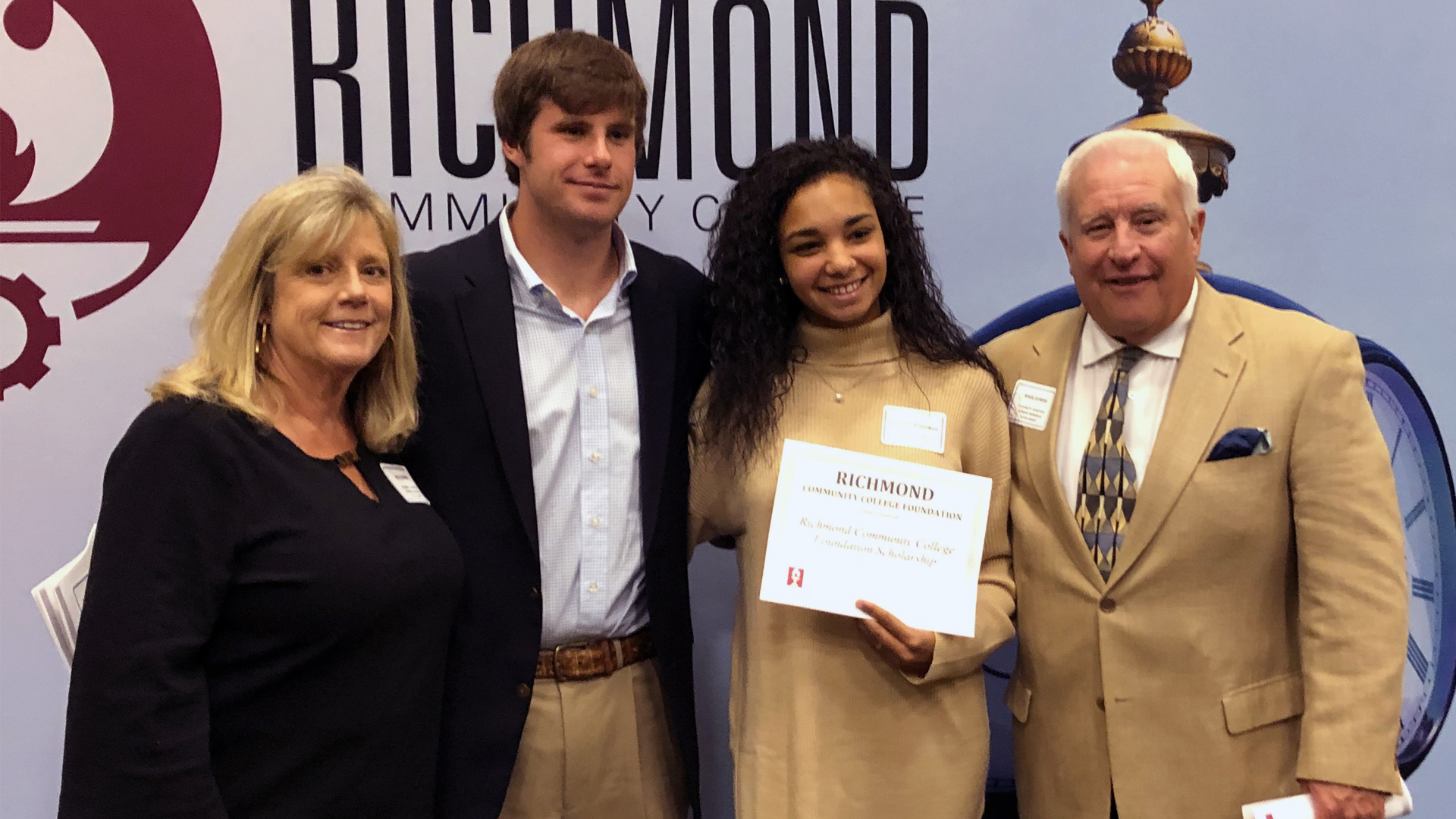 Wade Dunbar and family stand with a recipient of the Elizabeth Hampton Dunbar Memorial Scholarship.