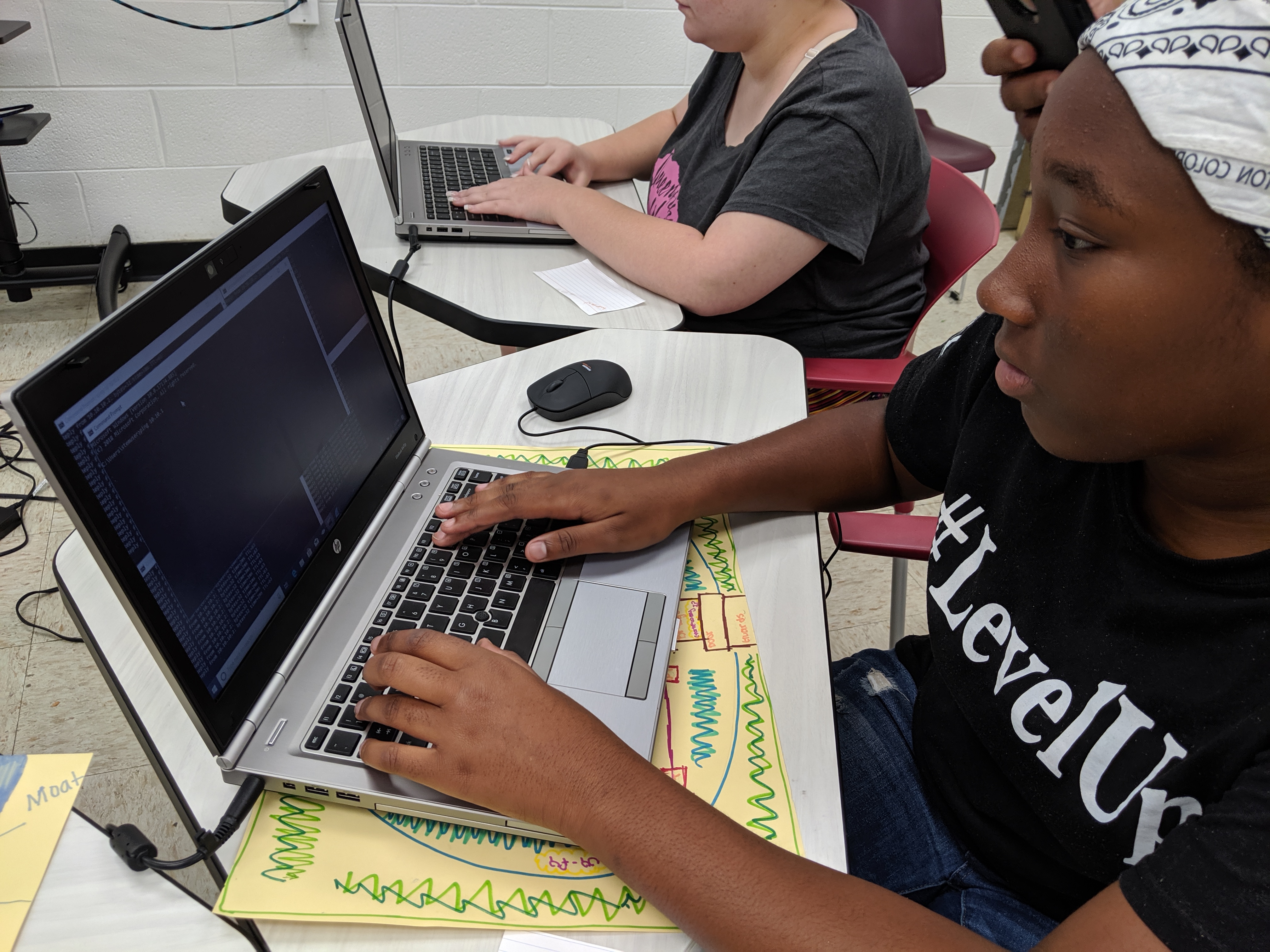  A STEAM Summer camp student views data from an attempted attack on a server