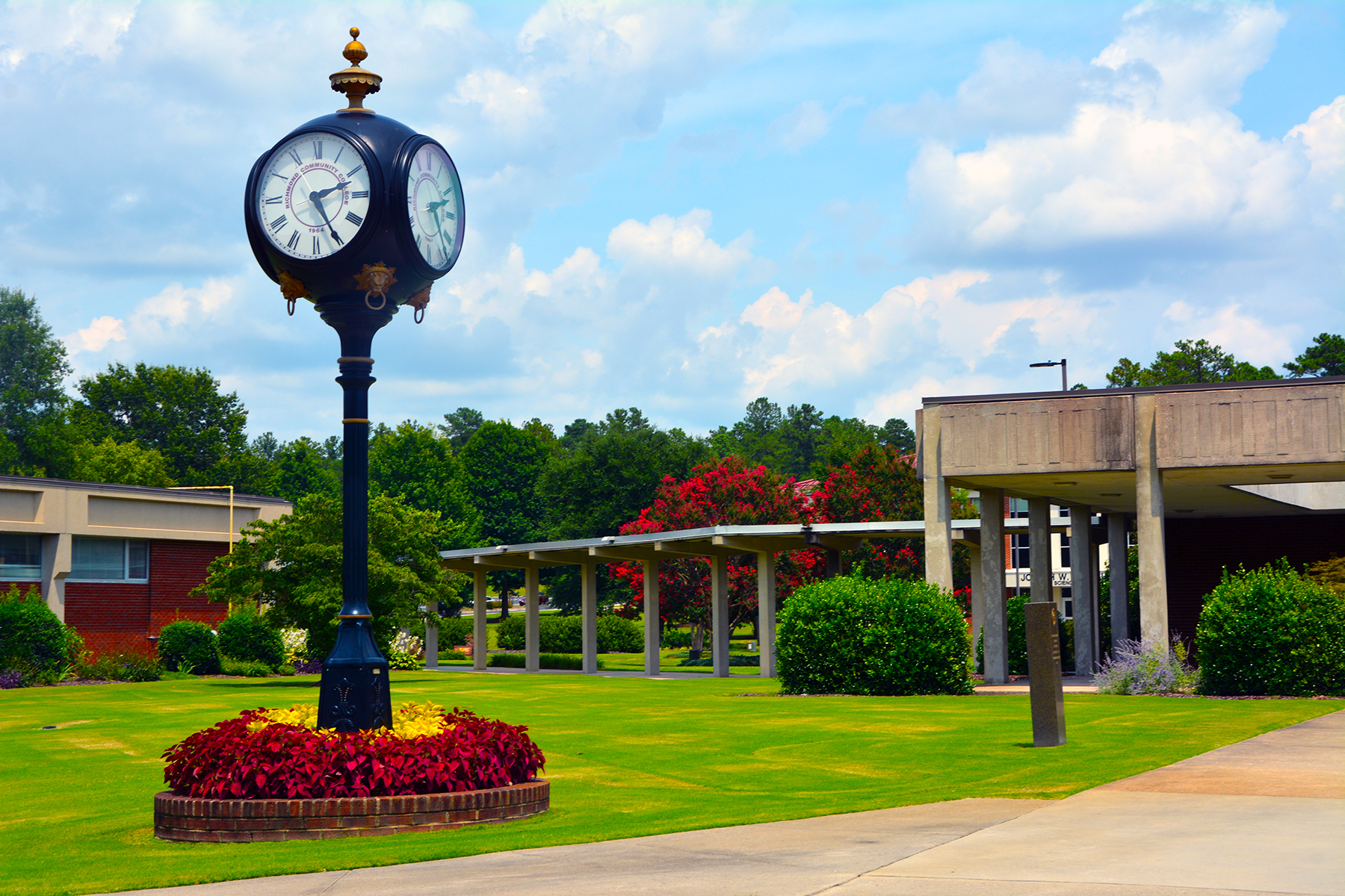 Photo of the campus with the clock on main campus