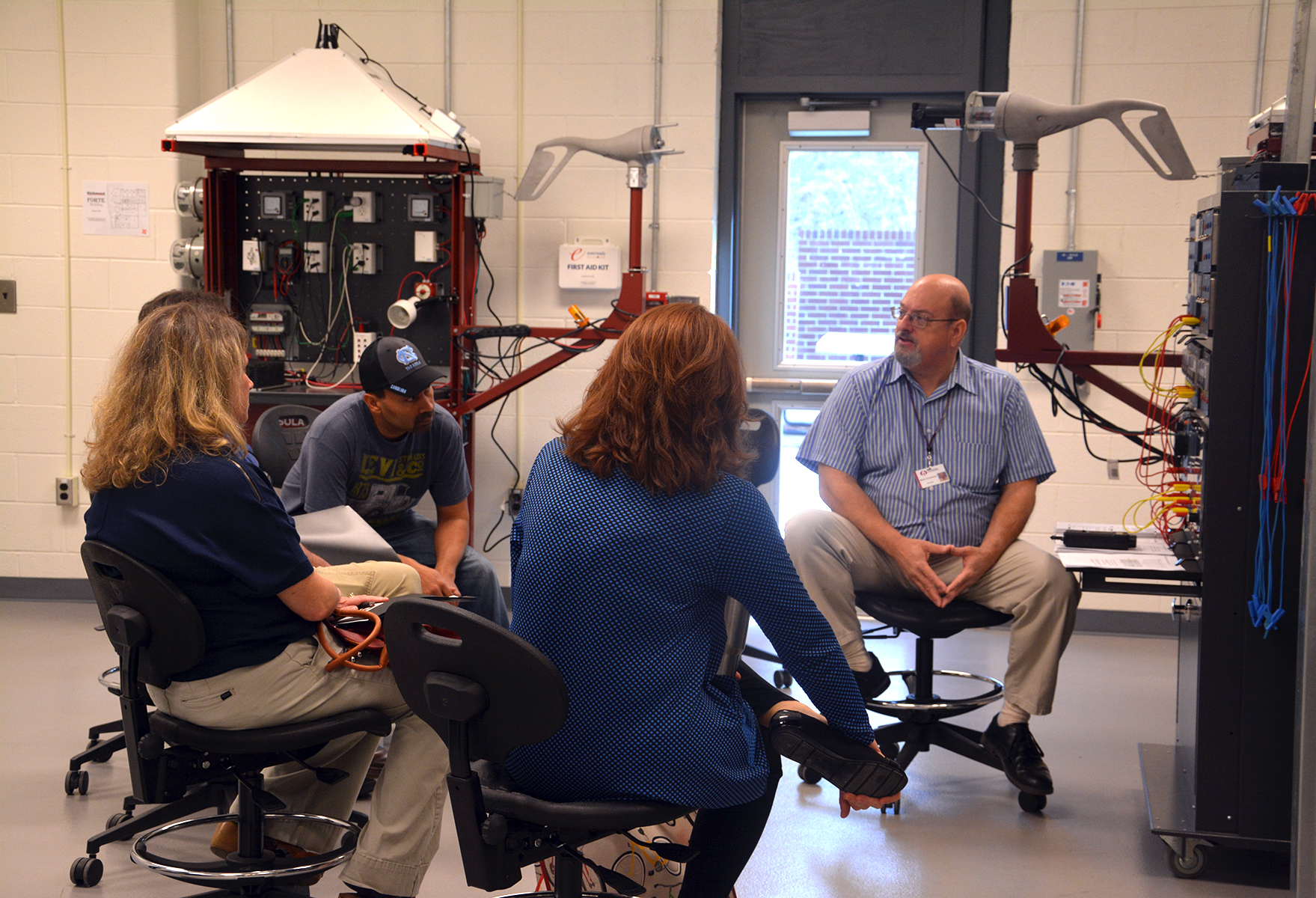 Lead instructor for the Industrial Systems Technology program at RichmondCC, Mark Treadaway, talks to educators from Richmond and Scotland counties about the skills students gain in his program and the career opportunities they have upon earning a degree, diploma or certificate.