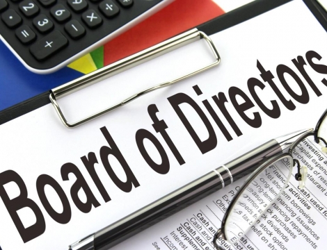 board of director clip board with glasses and keyboard