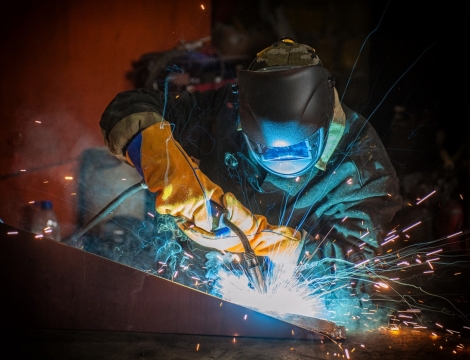man welding