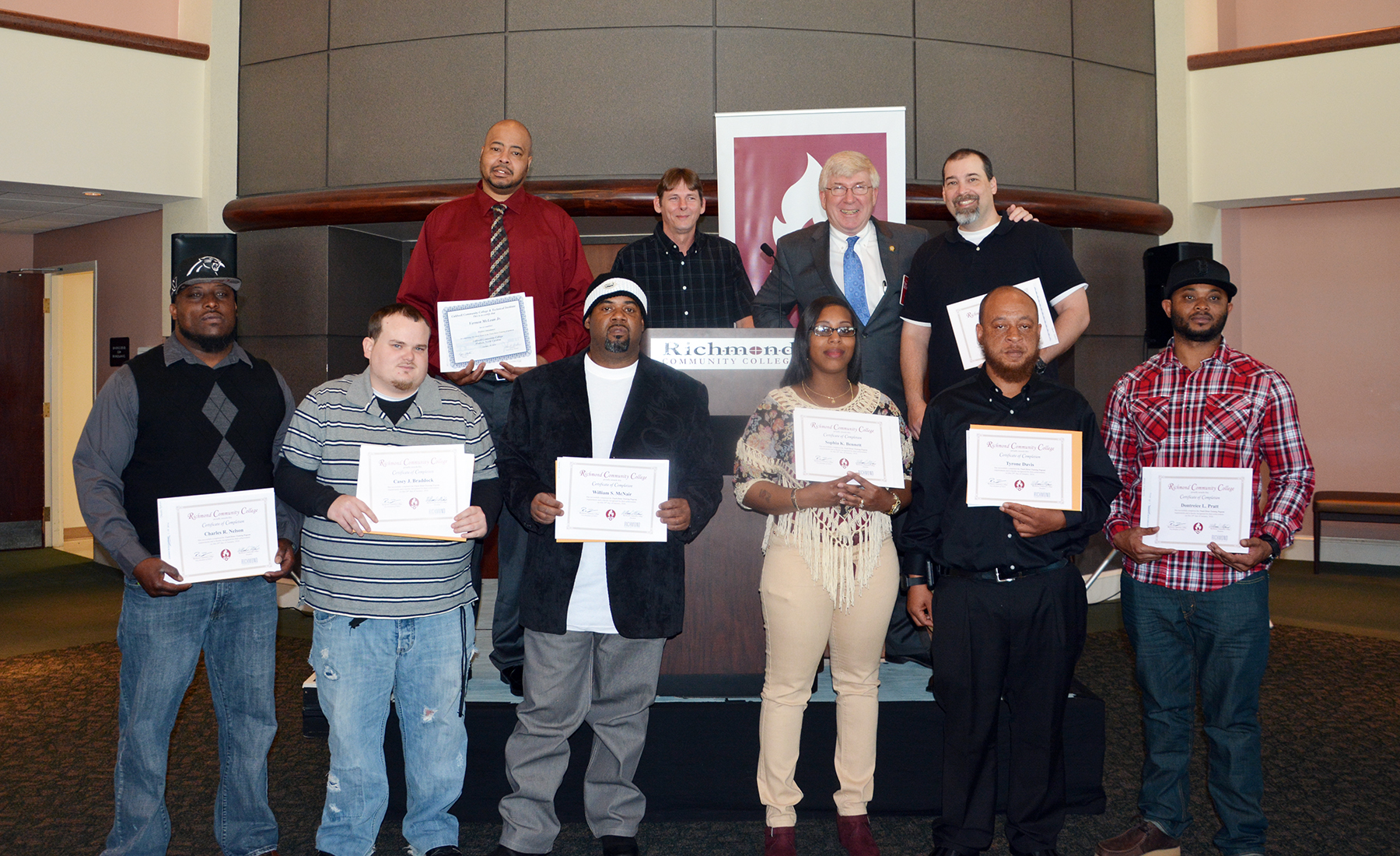 Sen. Tom McInnis stands with Richmond Community College’s truck driver training graduates who were recognized at a ceremony on Jan. 29 at the Cole Auditorium. McInnis was instrumental in securing funding for this program to make it affordable for people looking to begin a career with the trucking industry.