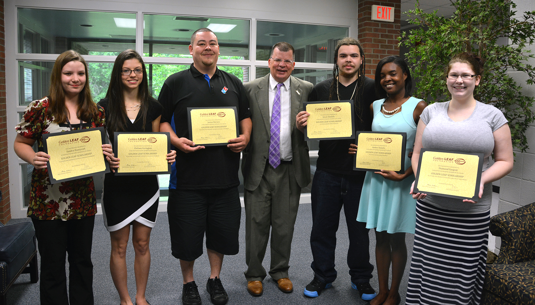 Pictured are Golden Leaf scholarship recipients, from left, Sandra Huneycutt, Chelsea Covington and James Rierson; Golden Leaf President Dan Gerlach; Golden Leaf scholarship recipients Jessie Daniels, Sandra Daniels and  Diamond Sargent. Not pictured are Golden Leaf scholarship recipients Jessica Penny and Jordan Smith. 