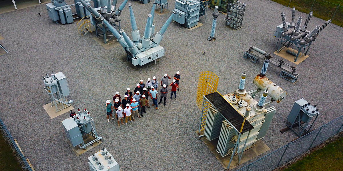 Aerial view of the Substation yard with students.