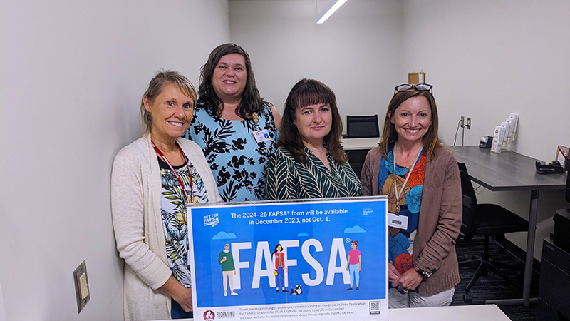 Staff members from the Financial Aid Office pose for a photo