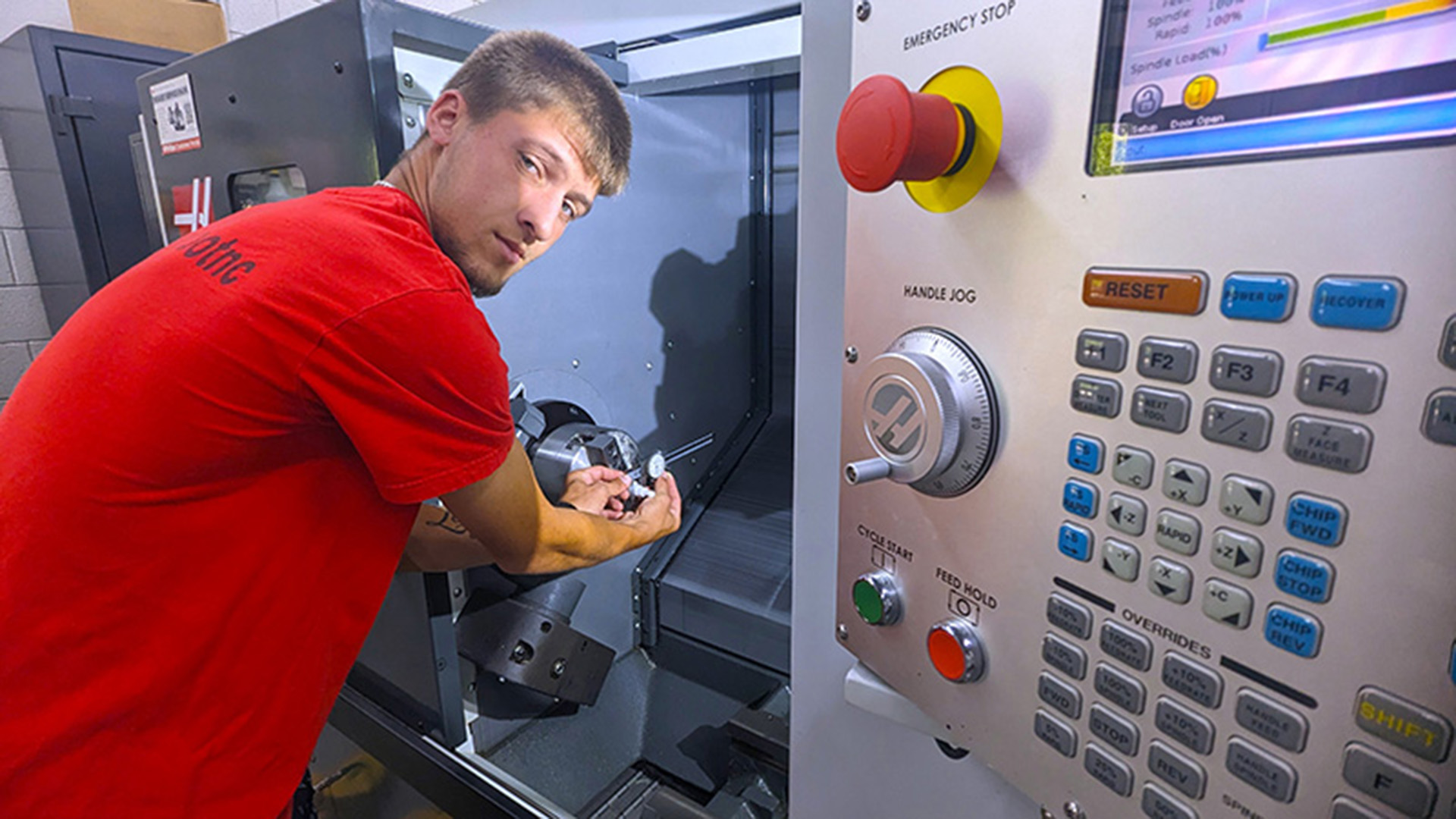 Student working on a CNC machine