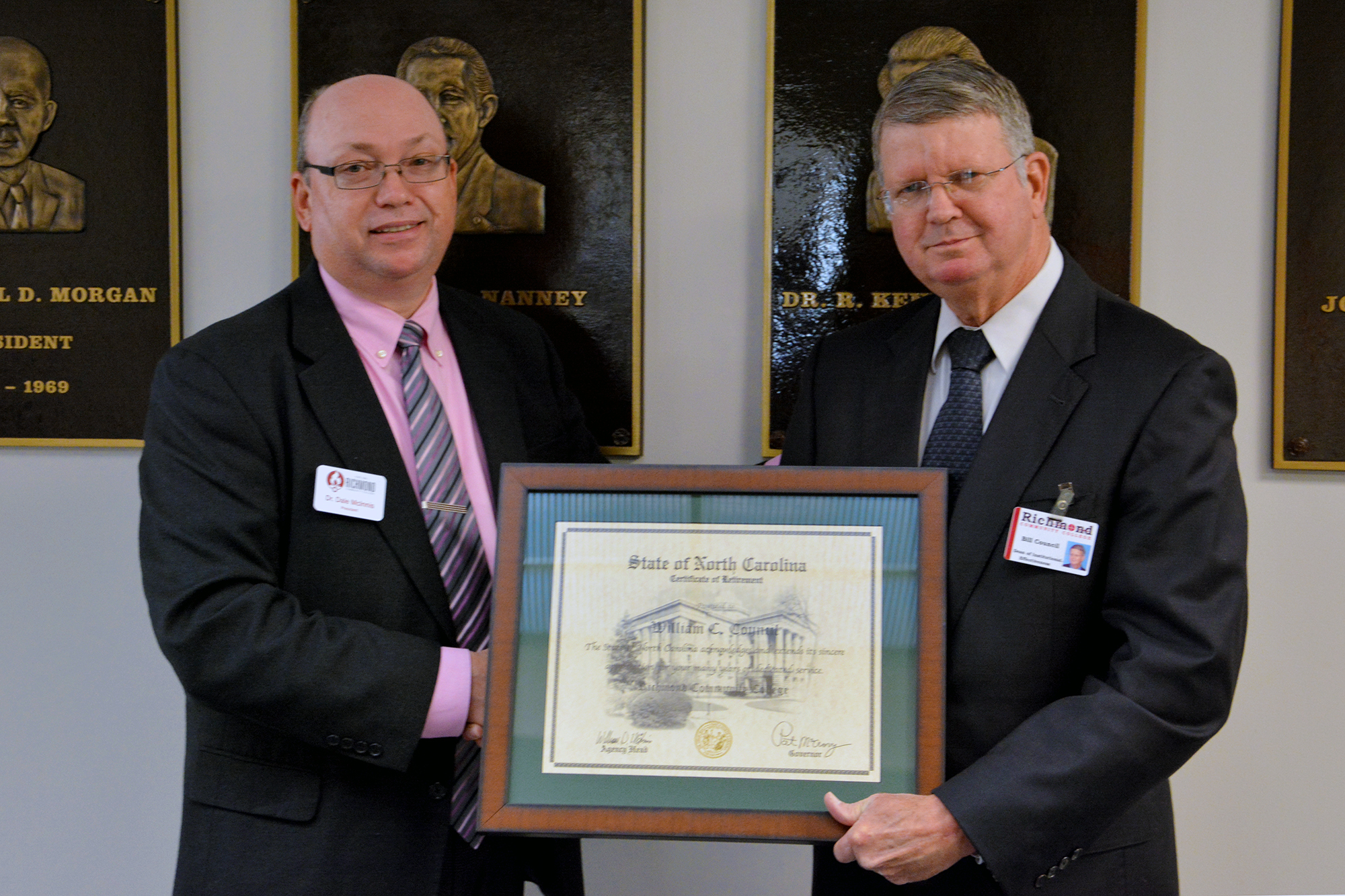 RCC President Dr. Dale McInnis (left) presents Bill Council with a plaque commemorating his retirement from the College. Council served as Dean of Advancement and later as Dean of Institutional Effectiveness and Accountability during his tenure at RCC. Council joined RCC after a distinguished career in the U.S. Army where he retired as a lieutenant colonel.