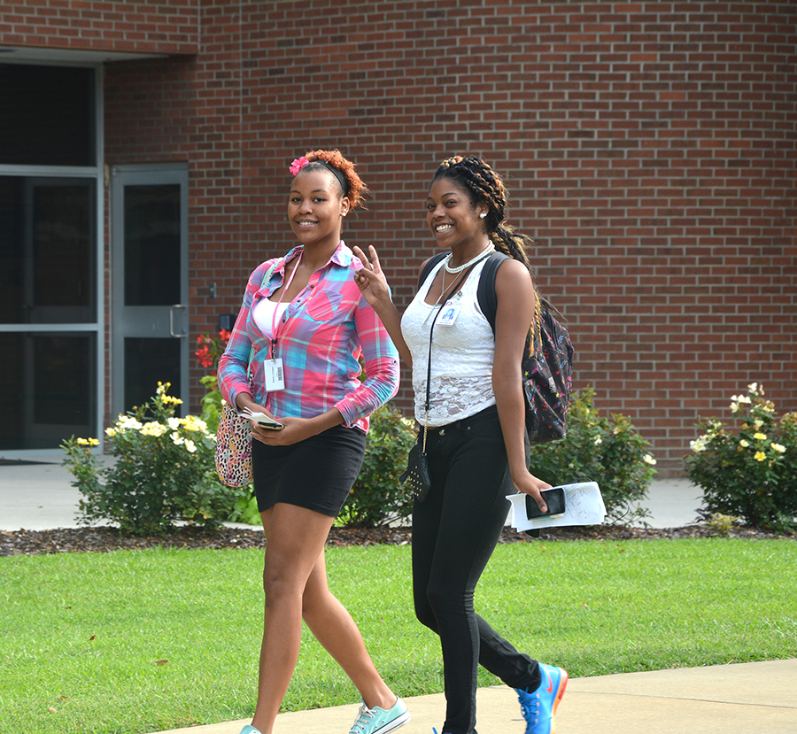 Students walking across campus to class at Richmond Community College