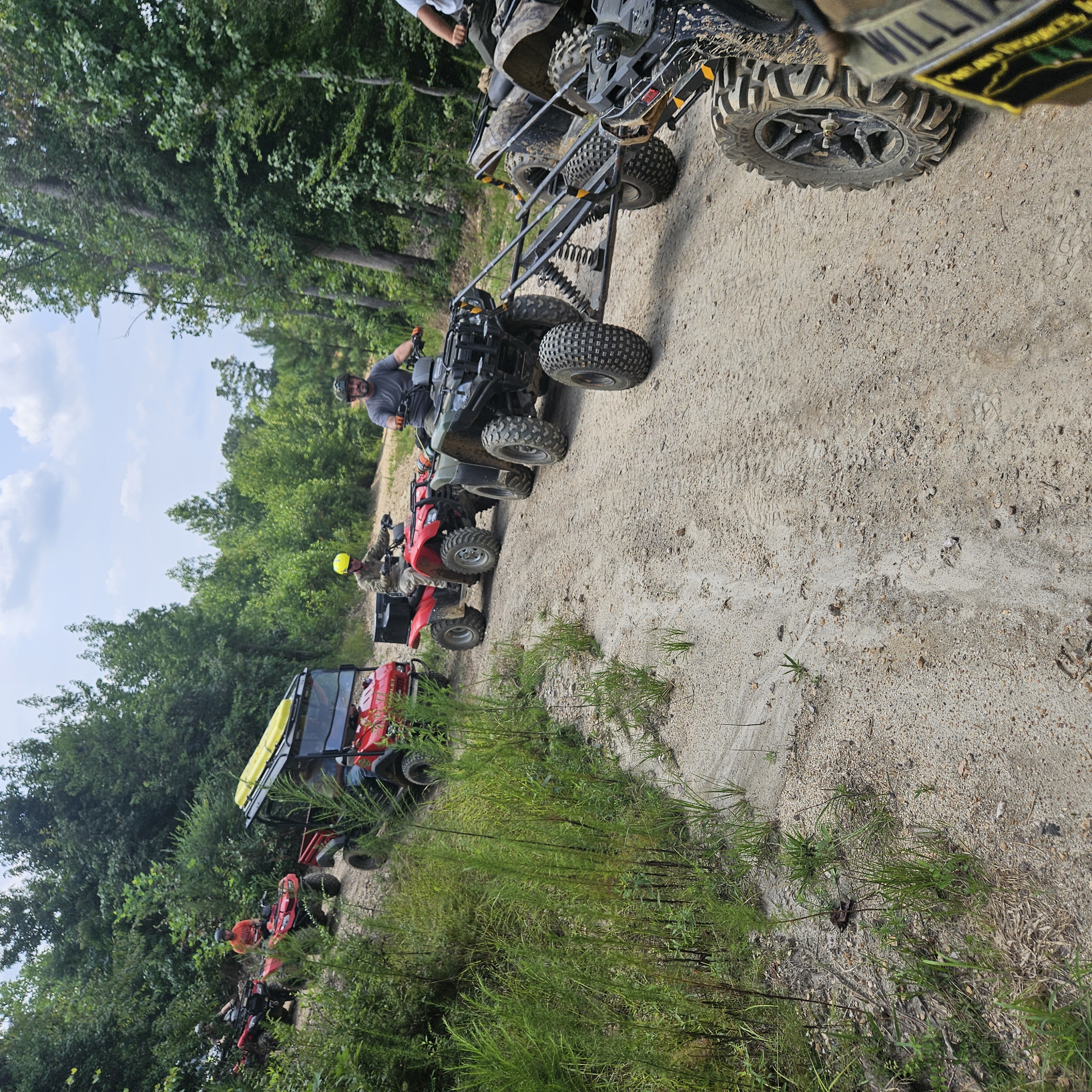 ATVs on a dirt road