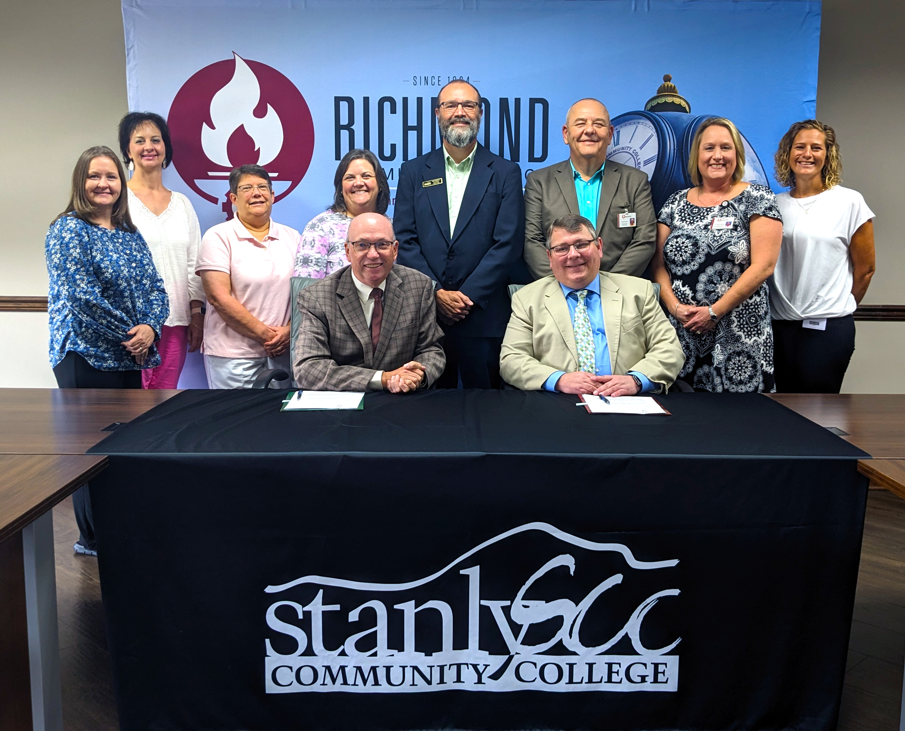 Faculty and staff from RichmondCC and Stanly Community College pose for a picture together.