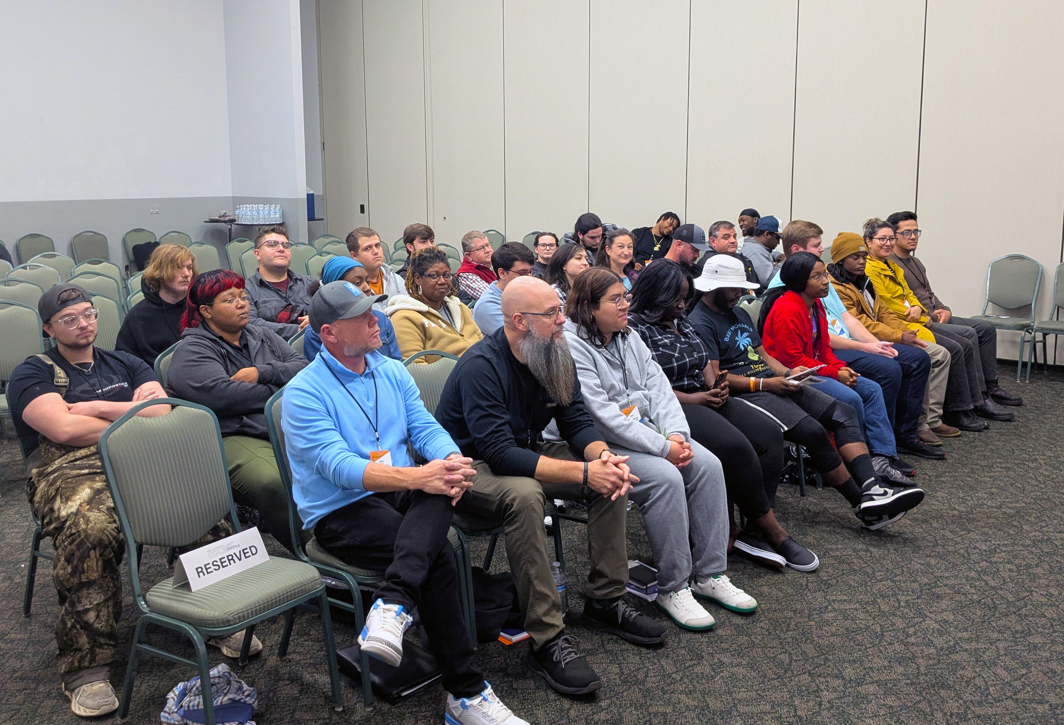 Students in the two-day AWS class wait for graduation.