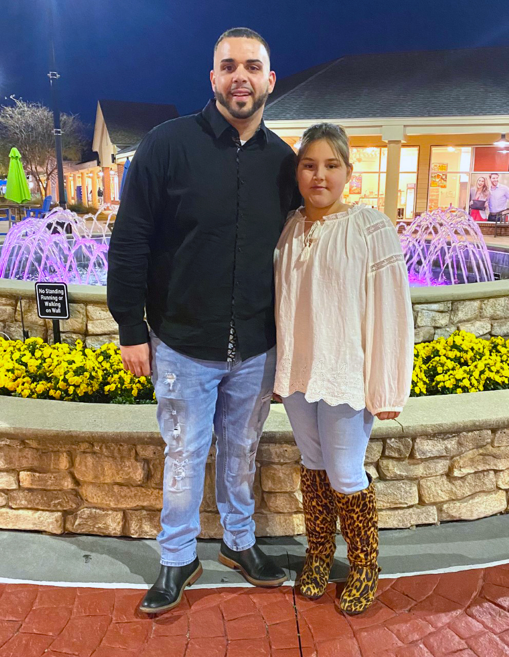 Benny Dimery and his daughter pose for a photo together