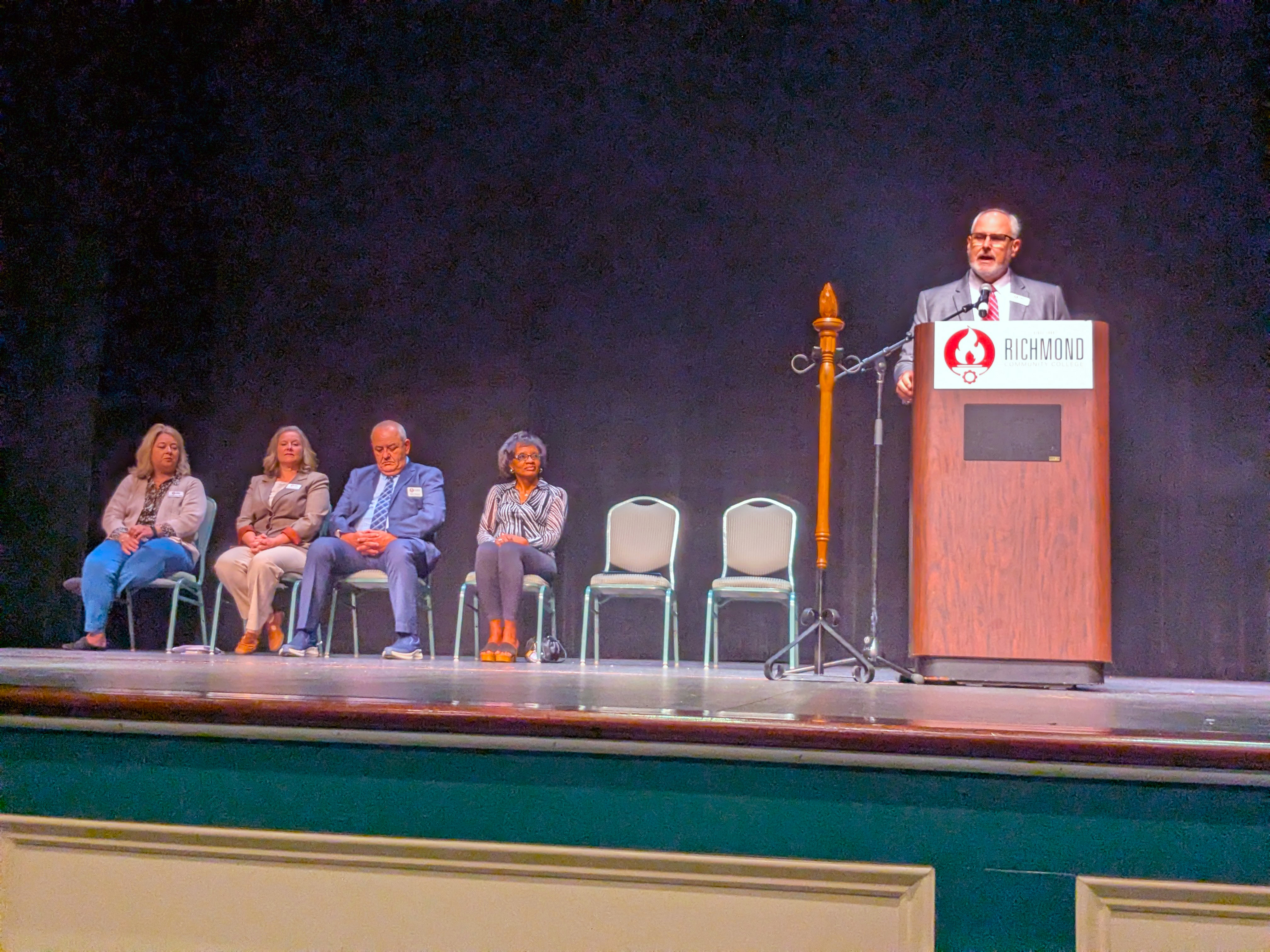 President Brent Barbee speaks on stage.
