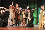 A Christmas Carol actors on stage