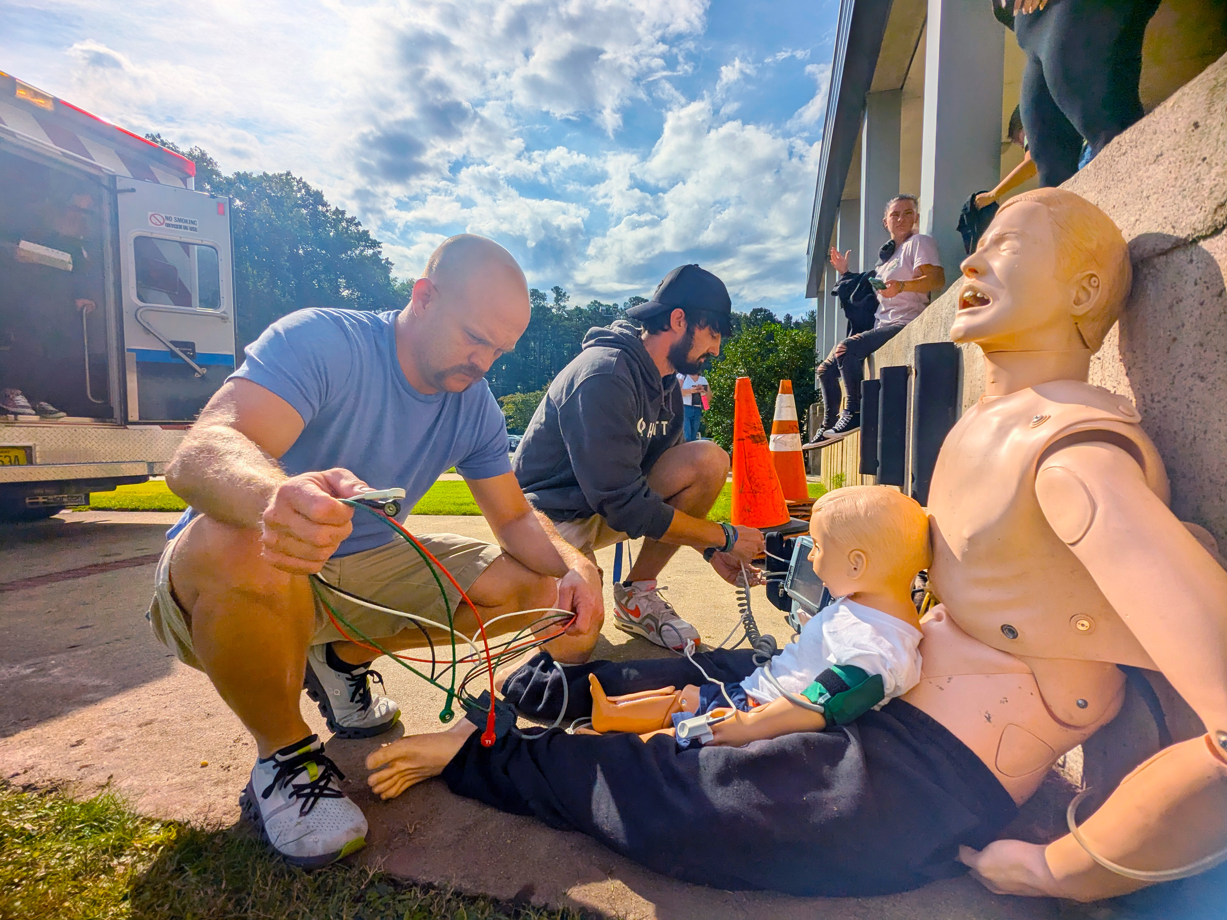 EMT students work on a mannequin