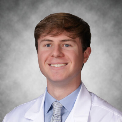 Noah Jordan in white coat