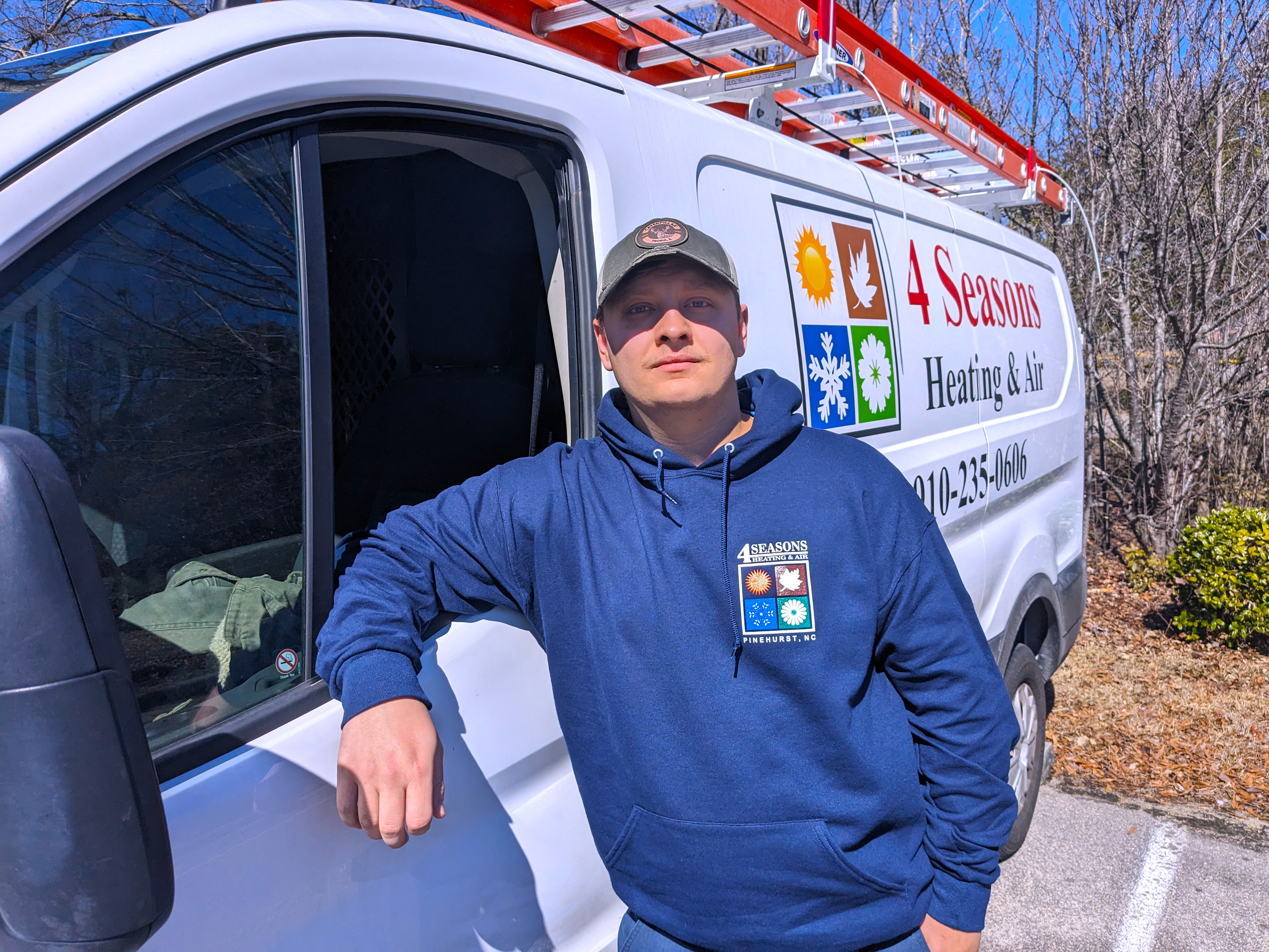 HVAC student Bryan Stevens with his work van