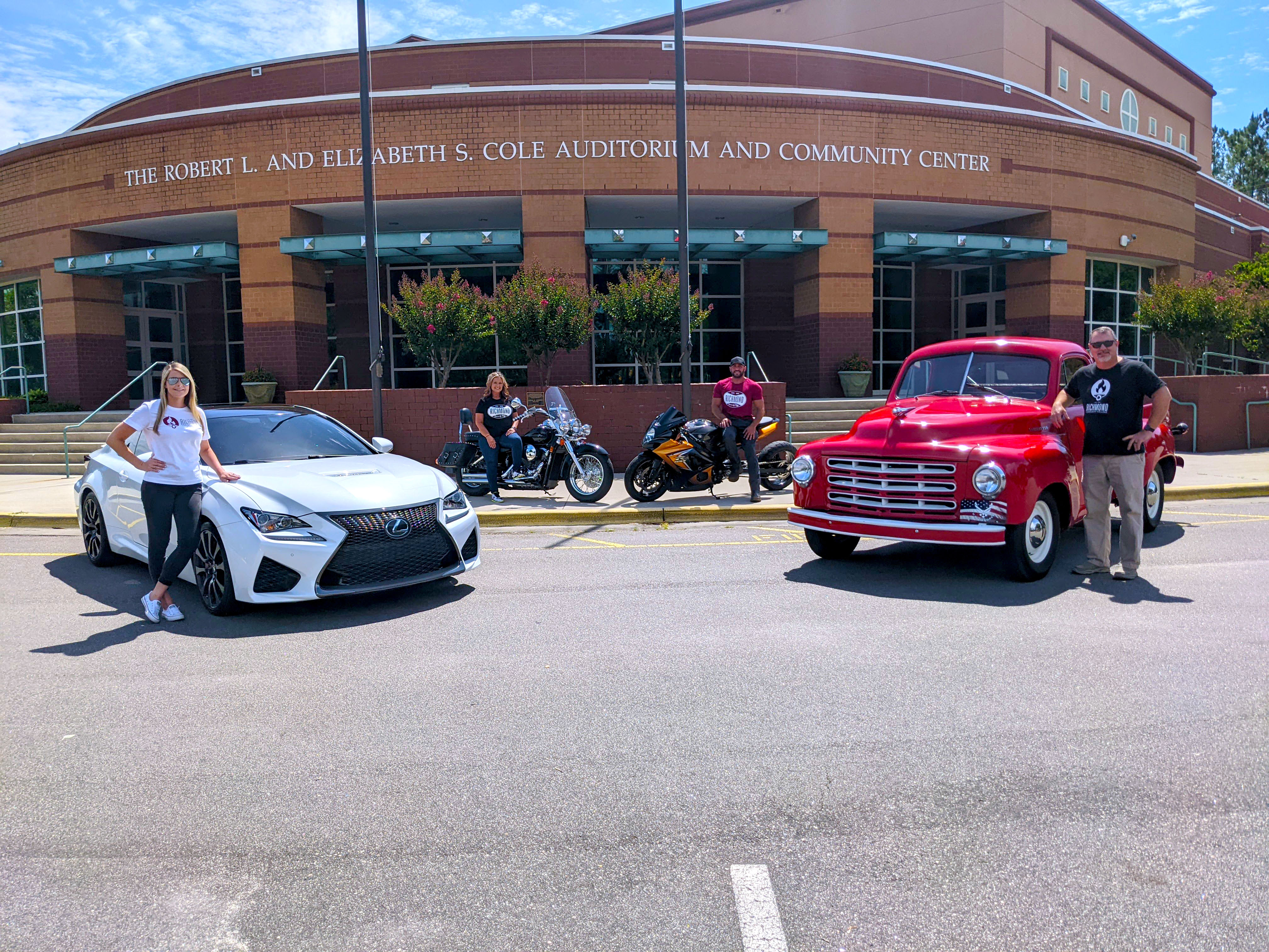 Car Truck and Bikes in front of the Cole Auditorium