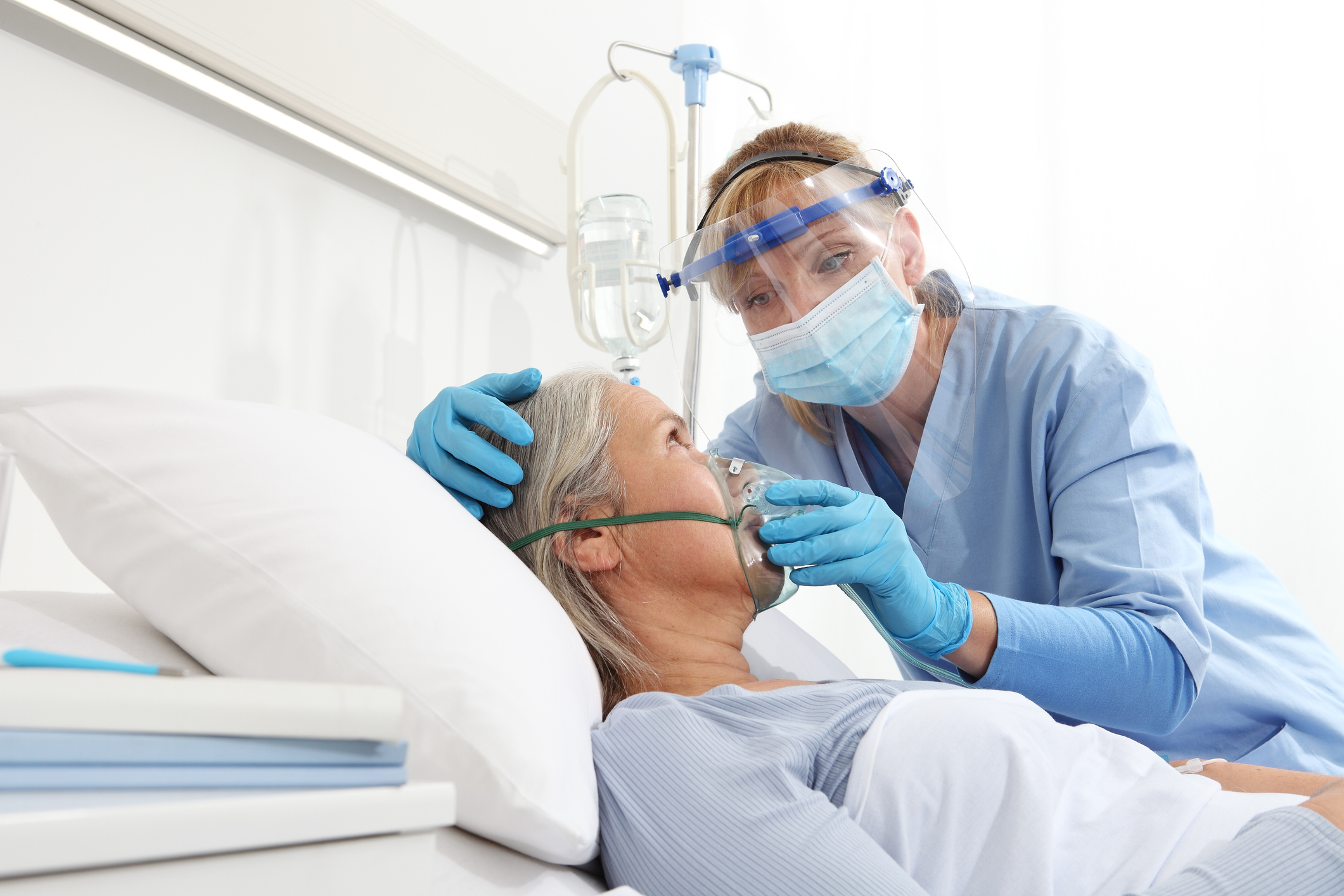 Respiratory therapist treating a patient