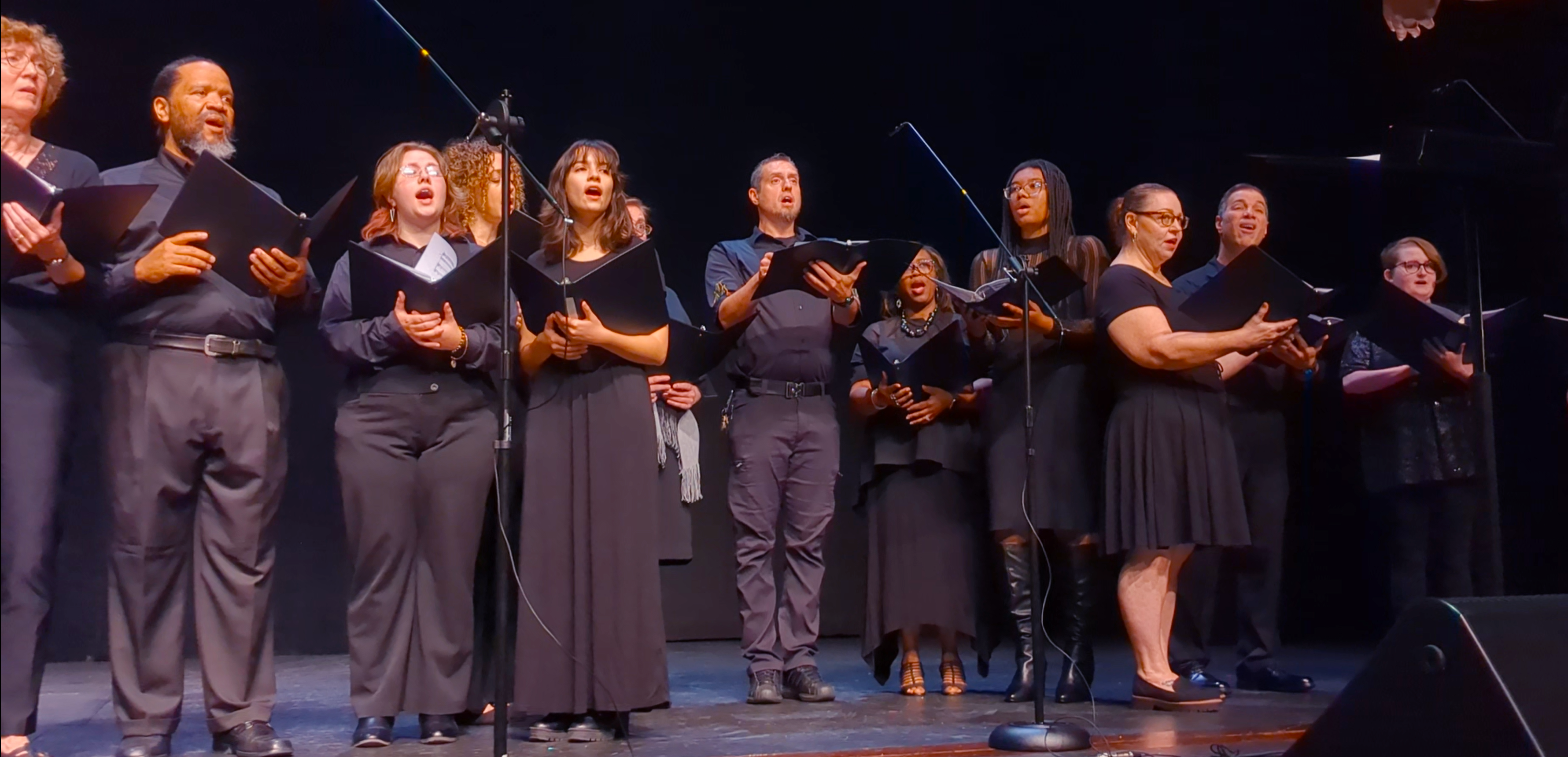 The RichmondCC Choir sings on stage at the Cole Auditorium