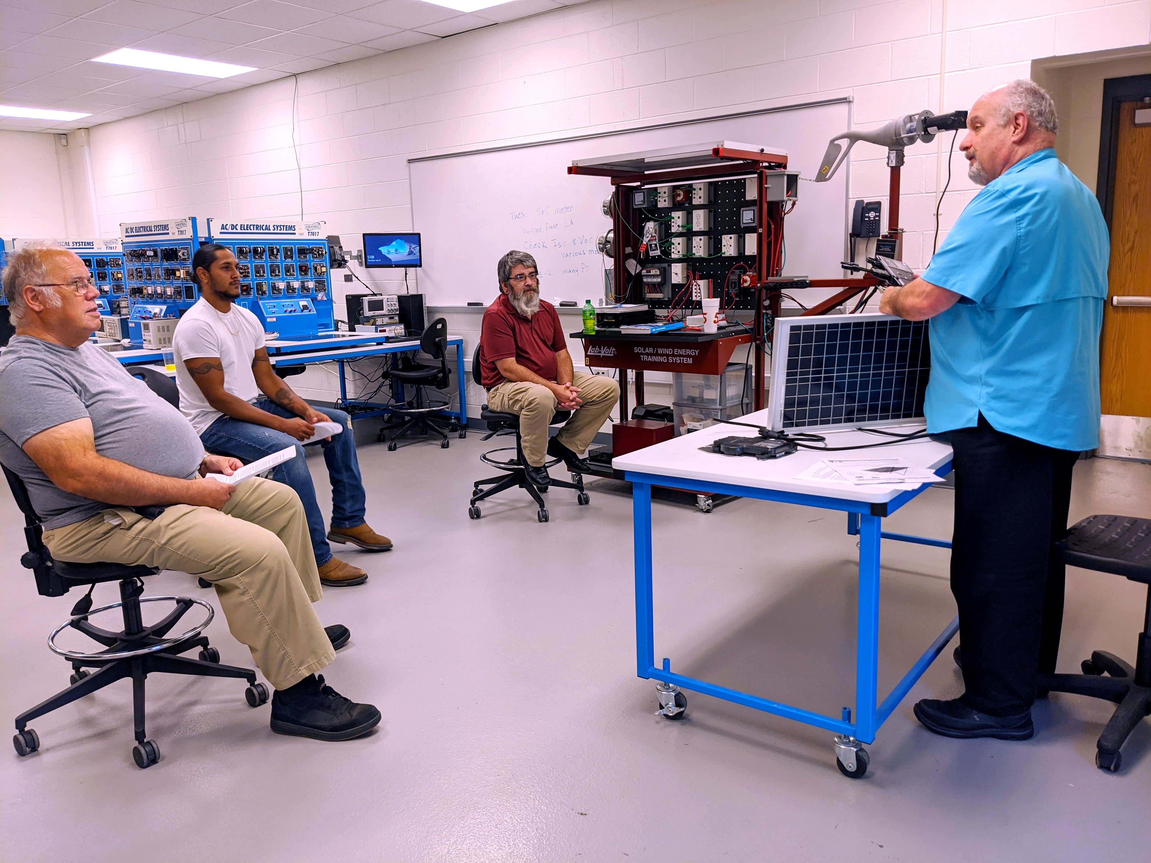 Solar energy class sits in lab