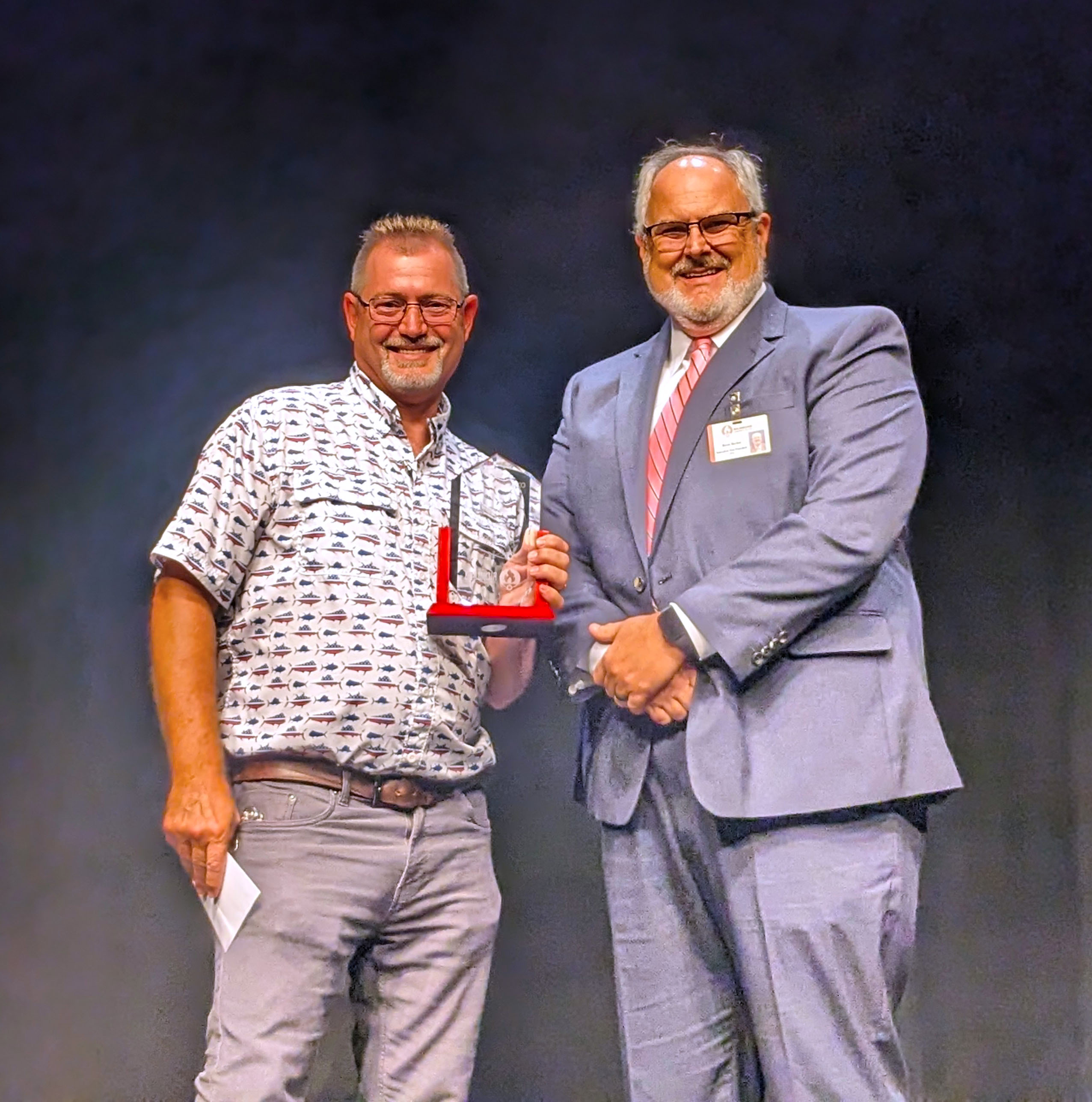 Tim Smoot accepts award from Brent Barbee.