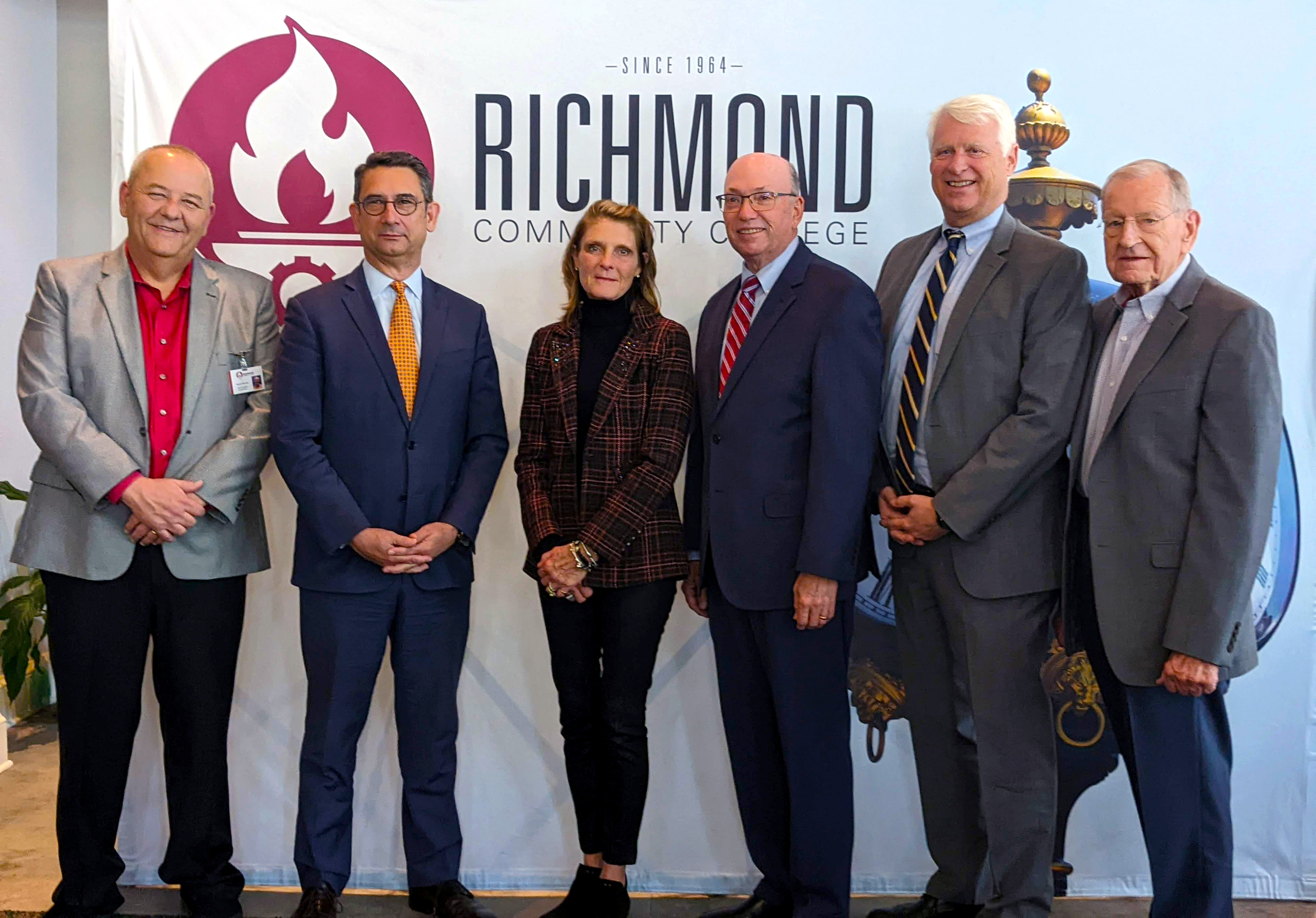 A group of leaders from Wingate University and RichmondCC pose for a photo.