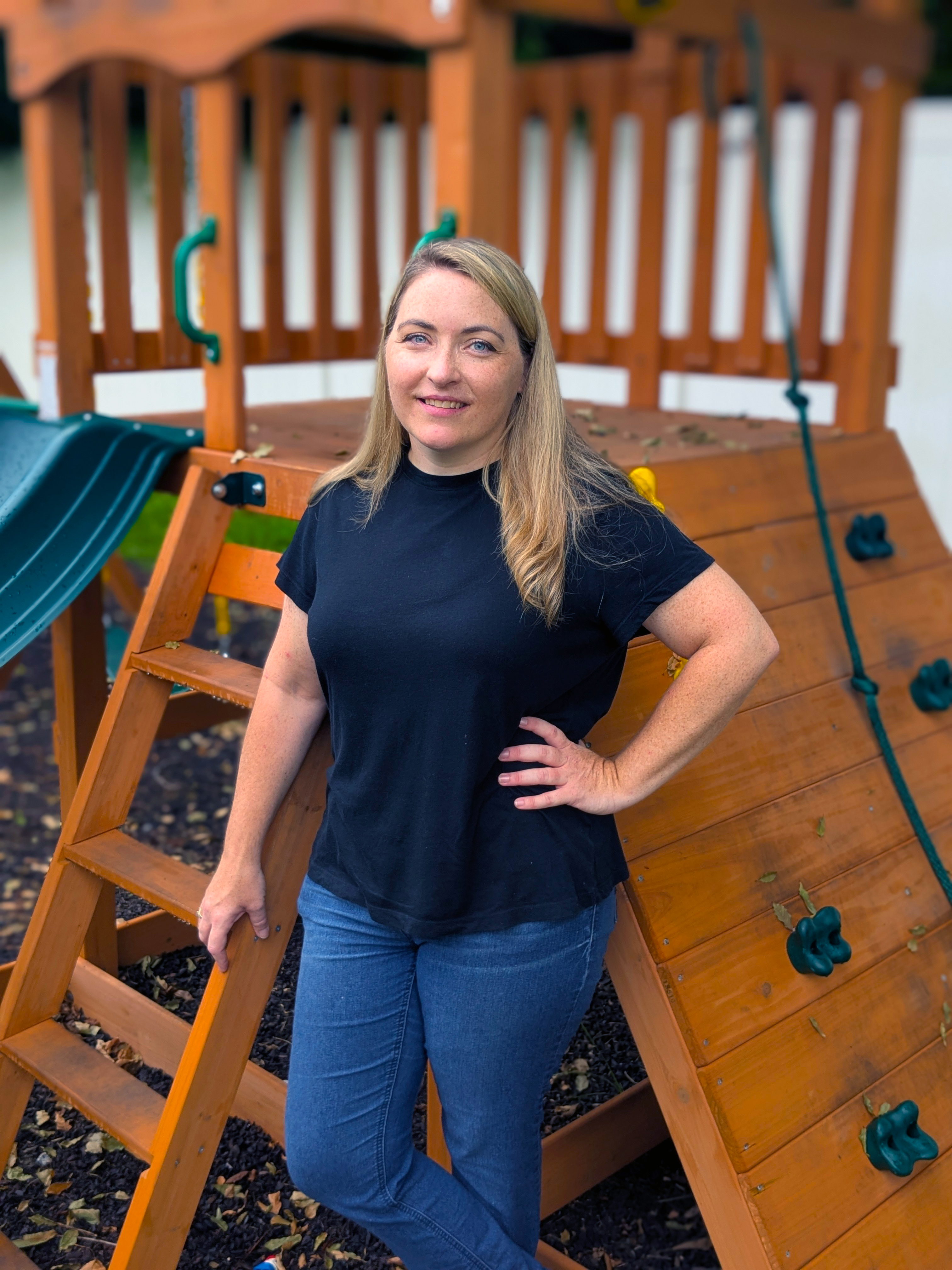 Tina Hildreth stands by swing set