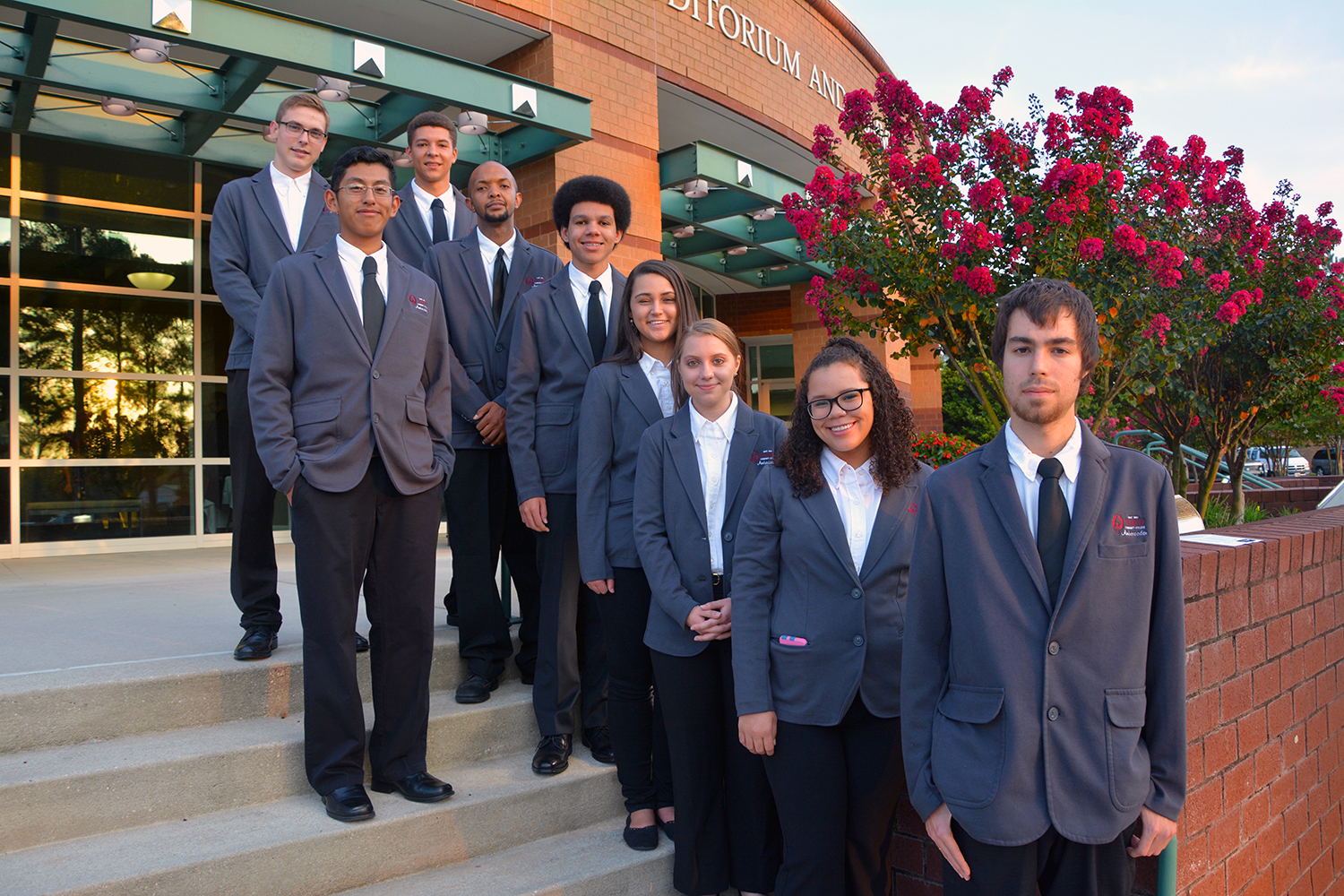 Student Ambassadors standing on the steps of the Cole Auditorium