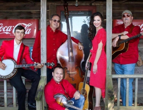 Caroline band members on a porch