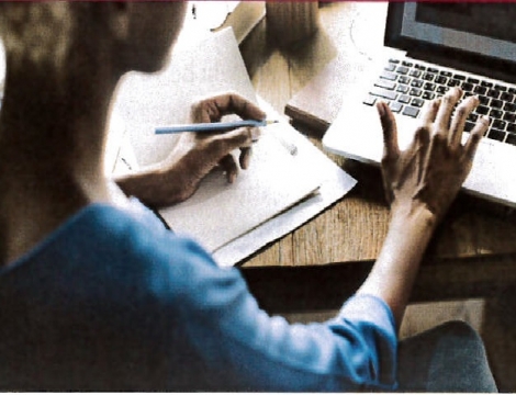 woman sitting at laptop