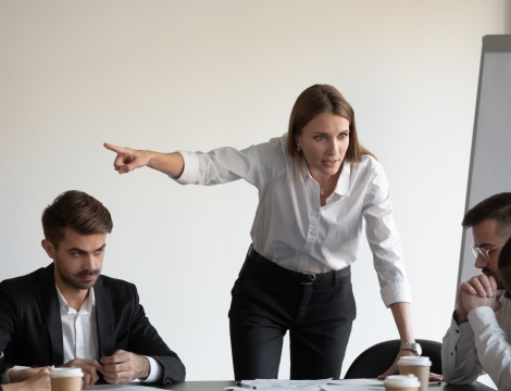 image of woman yelling at employees 