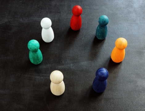 figures representing people standing in a circle