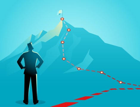 Shape of a person standing before a mountain with various stops on the path to a goal at it's peak