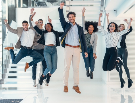 a group of happy people at work 