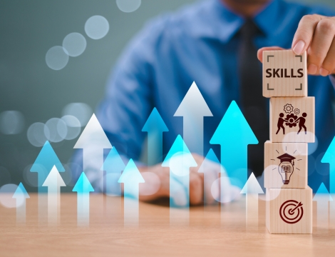 Photo of a person stacking blocks representing industry skills