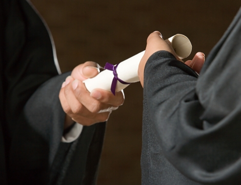 Handing a diploma photo 