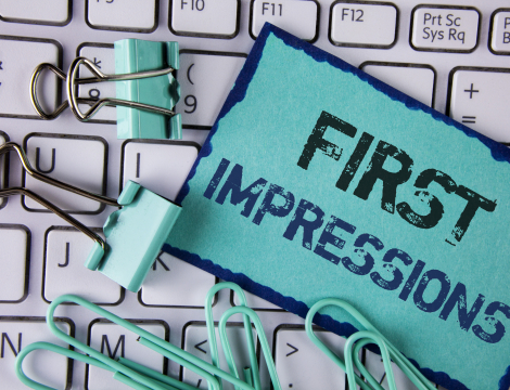Sticky note that reads "First Impressions"