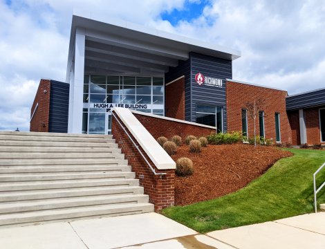 Photo of the Lee Building with cloudy sky background