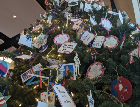 Ornaments honoring veterans decorating a tree