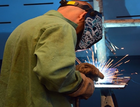 man welding