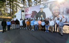 Group of CDL Graduates posing in front of the 18 wheeler truck