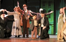 Performers on stage of A Christmas Carol