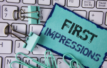A sticky note reading "first Impressions" 