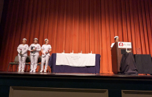 Photo of a previous LPN Graduation on stage at the Cole Auditorium
